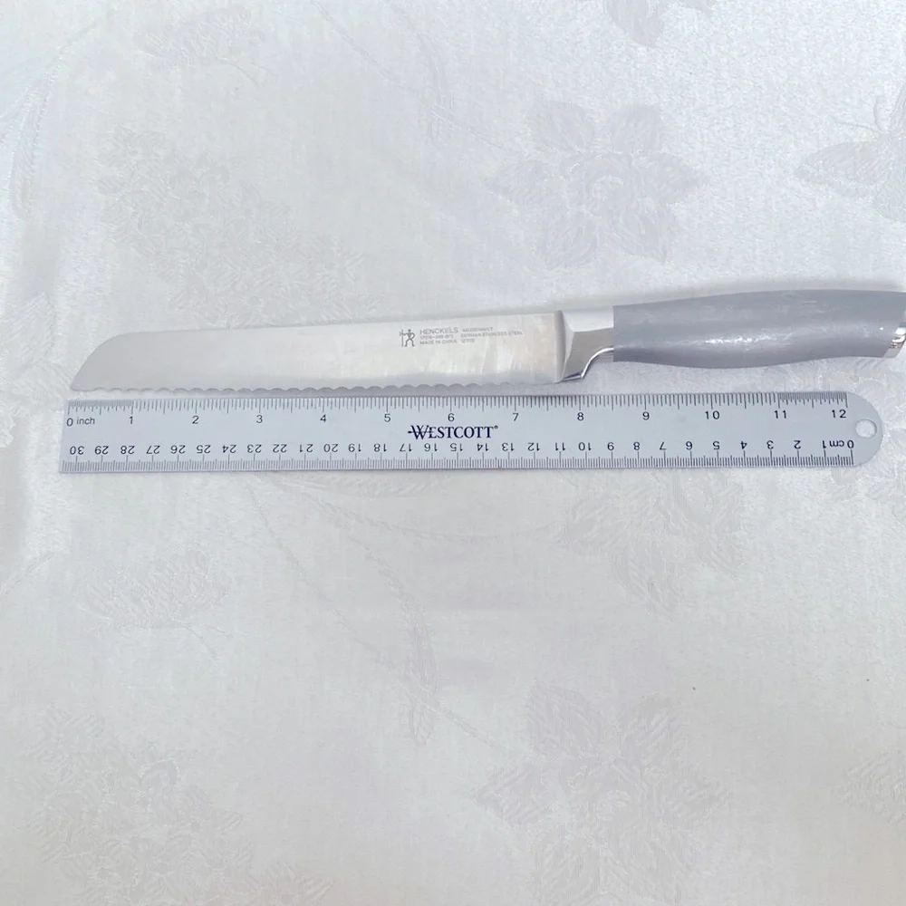 HENCKELS Modernist Stainless Steel 8 Inch bread knife. Great preowned condition